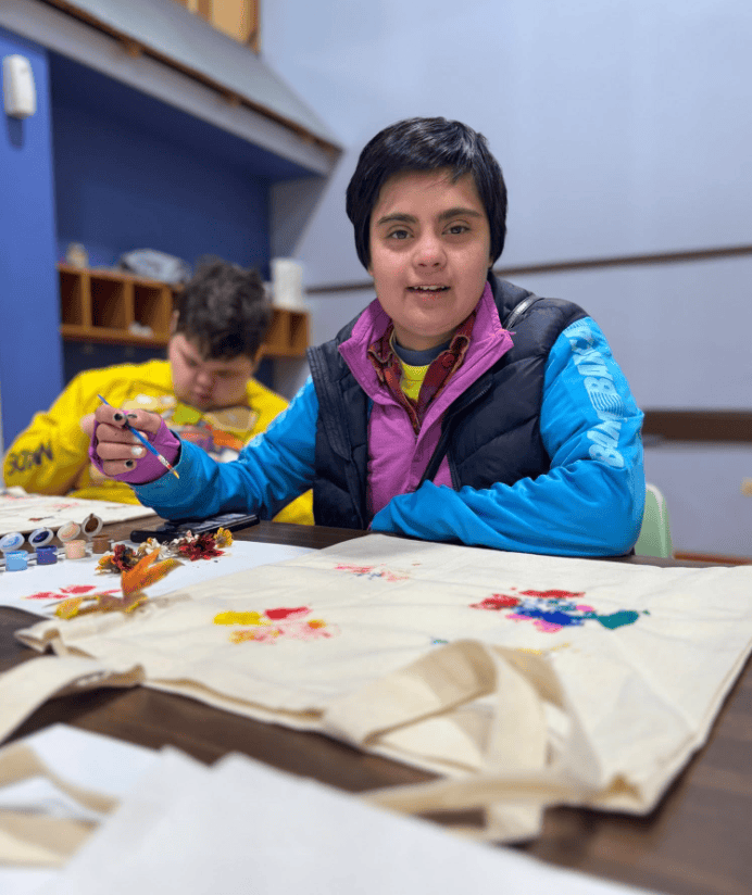 a woman doing arts and crafts