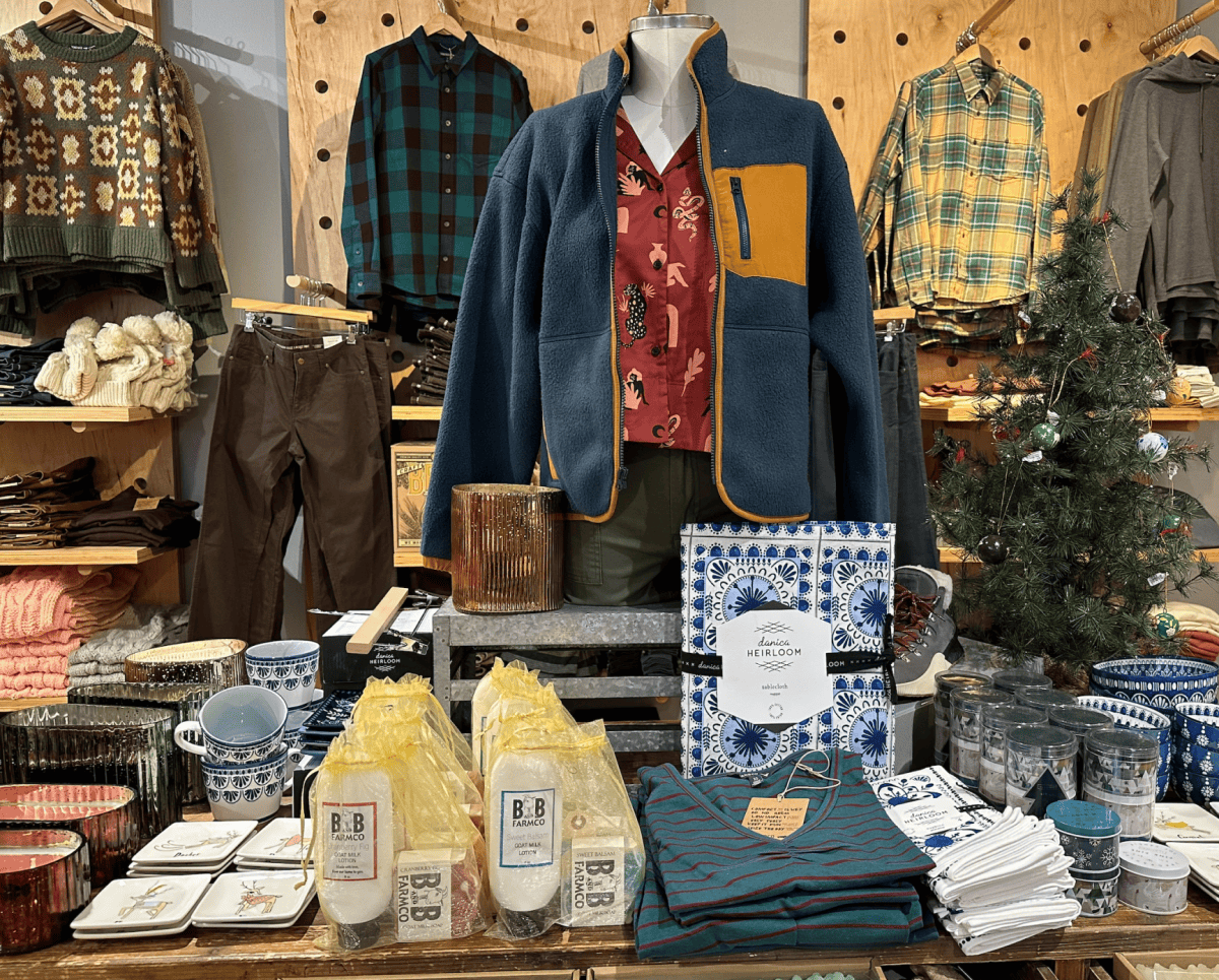 Store display with candles, coasters, and cards