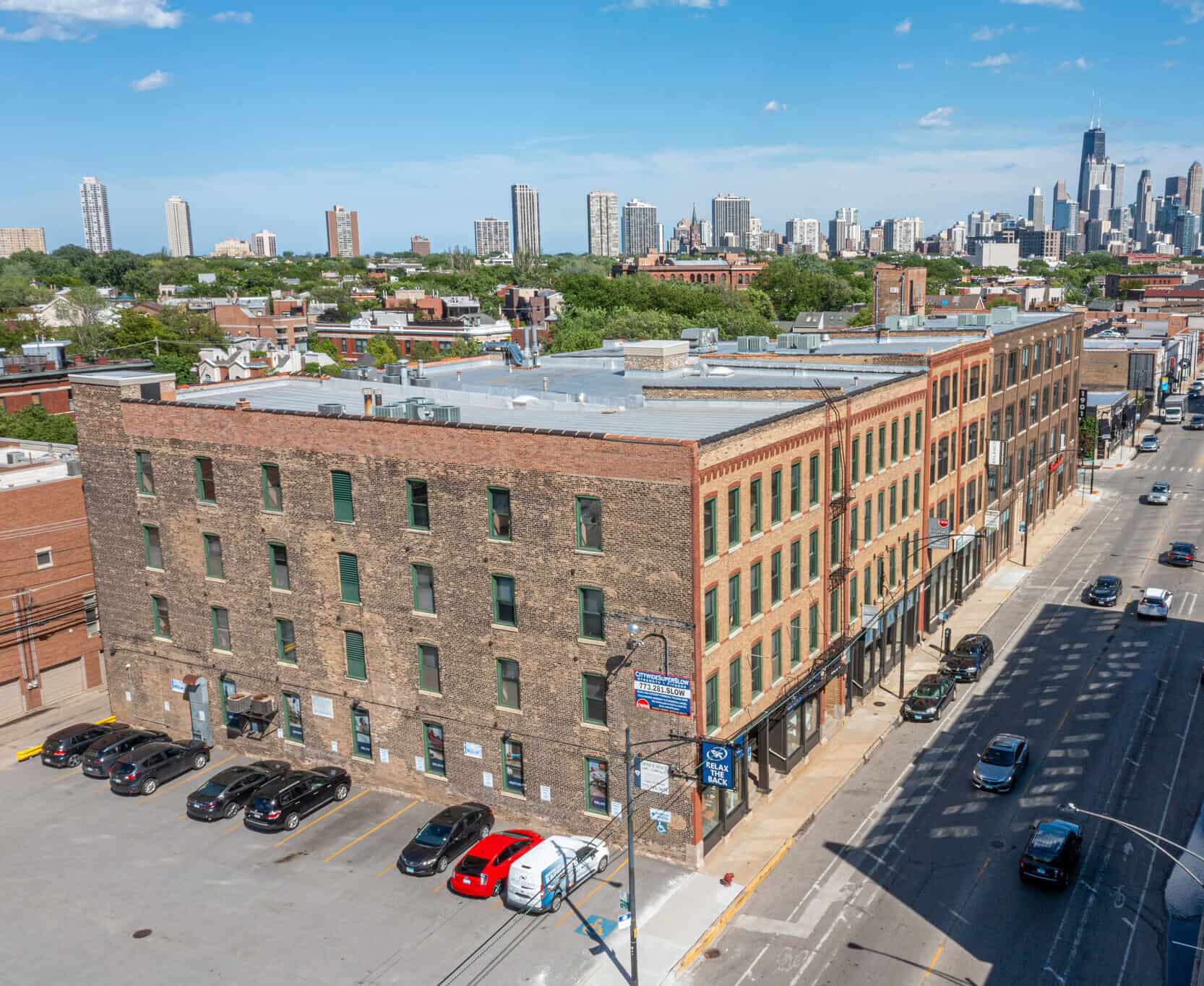 Search360 office on Clybourn Ave in Chicago, the Chicago skyline in the background