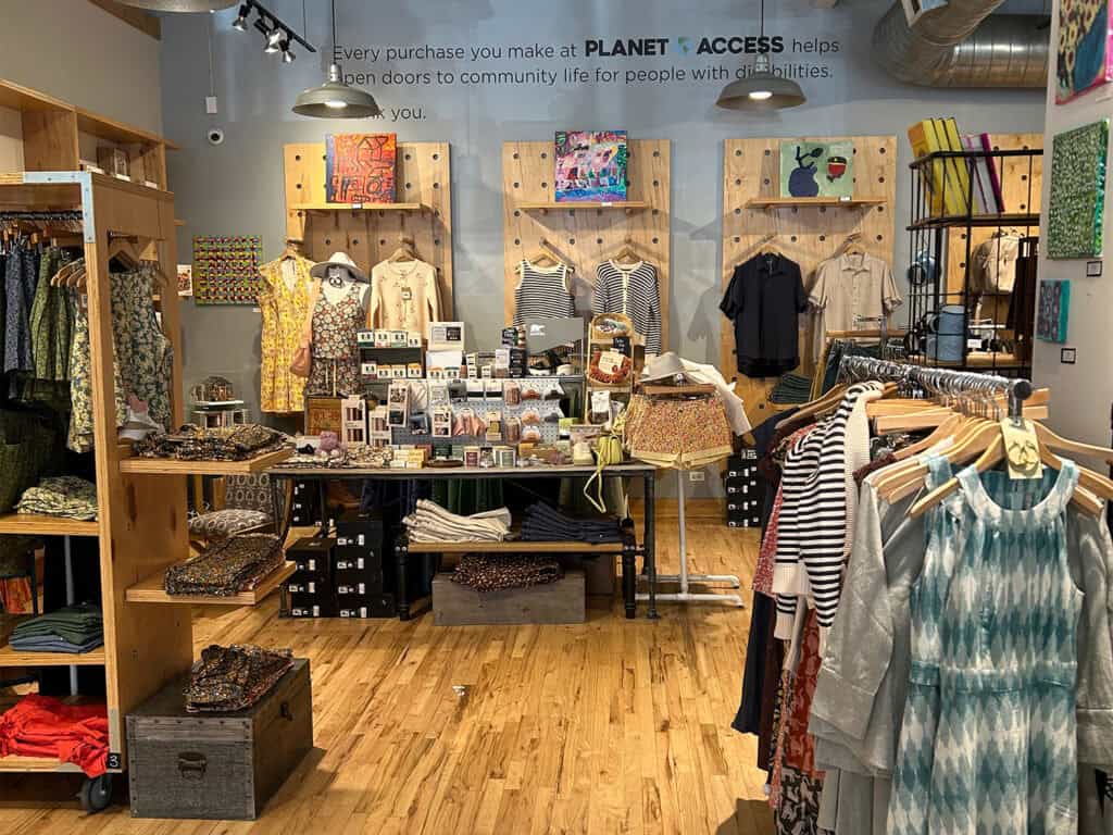 Planet Access store, clothes and other goods on display