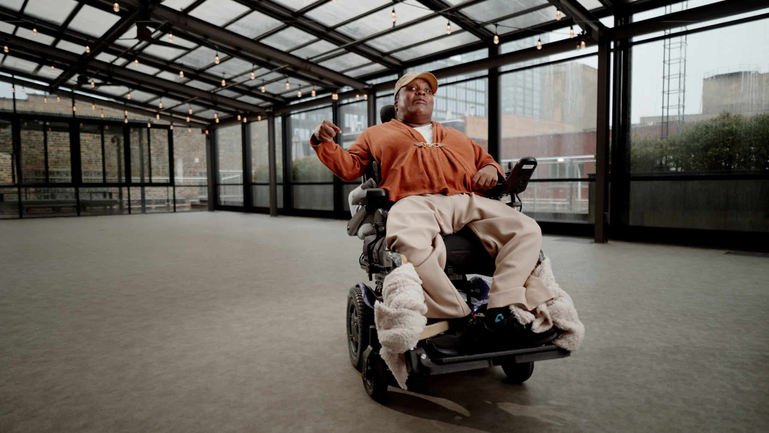 katie in wheelchair in interview space